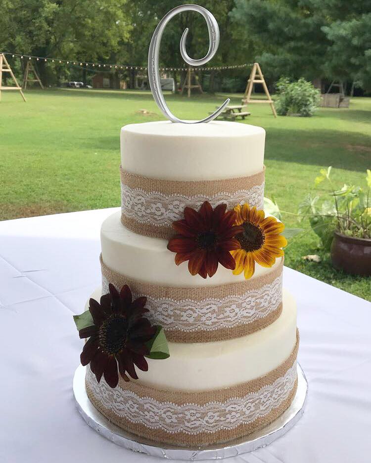 Deep Red and Yellow Florals on White Cake with Burlap and Lace