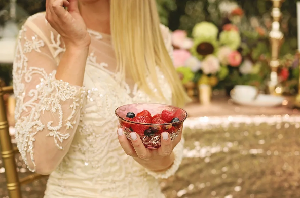 Lace wedding gown and berries