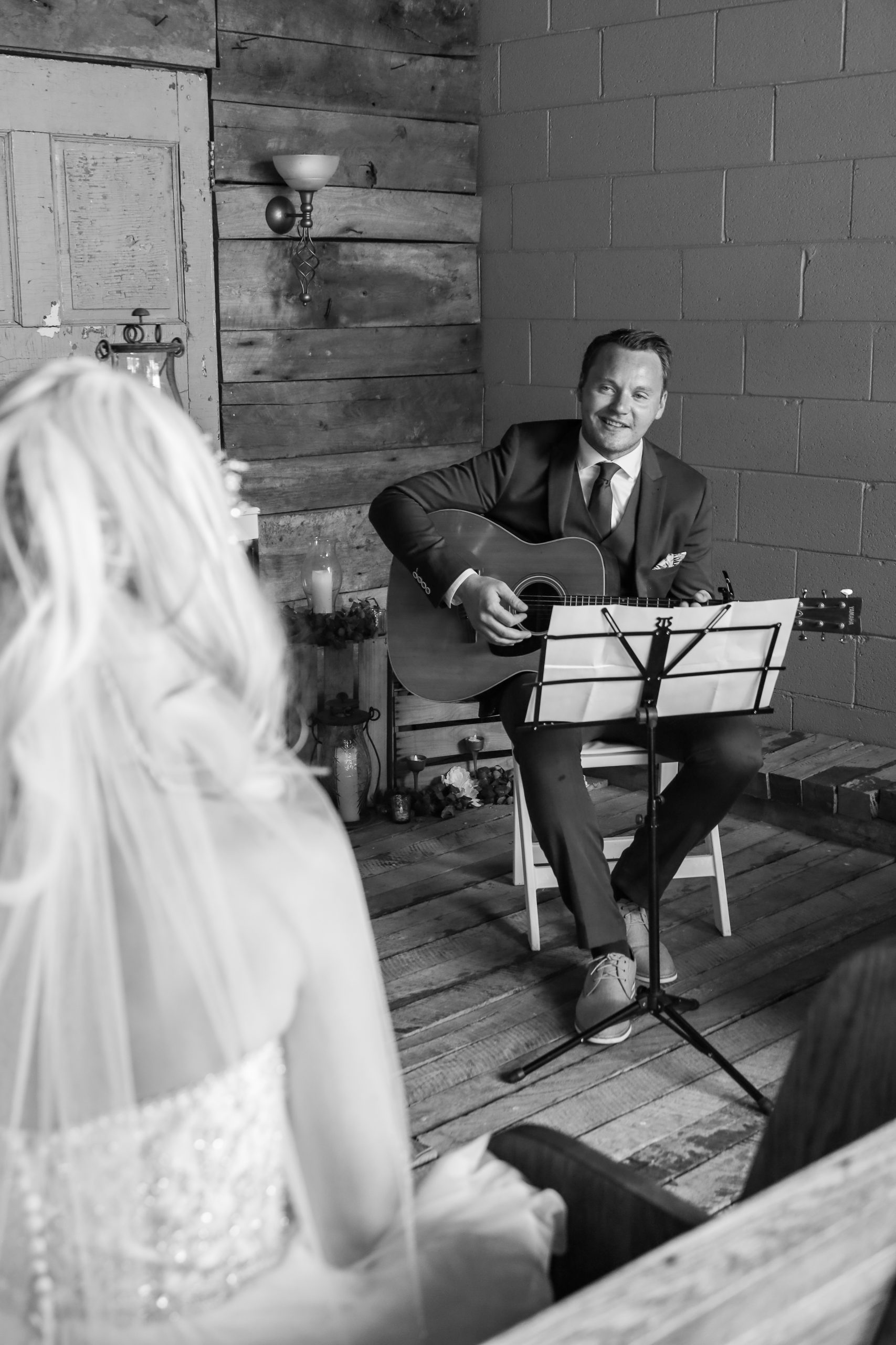 Groom Sings to Bride 