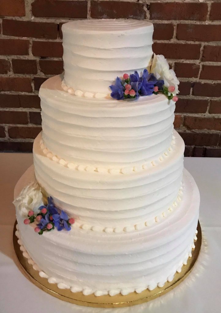 Wedding Cake with Purple flowers - The Rolling Pin